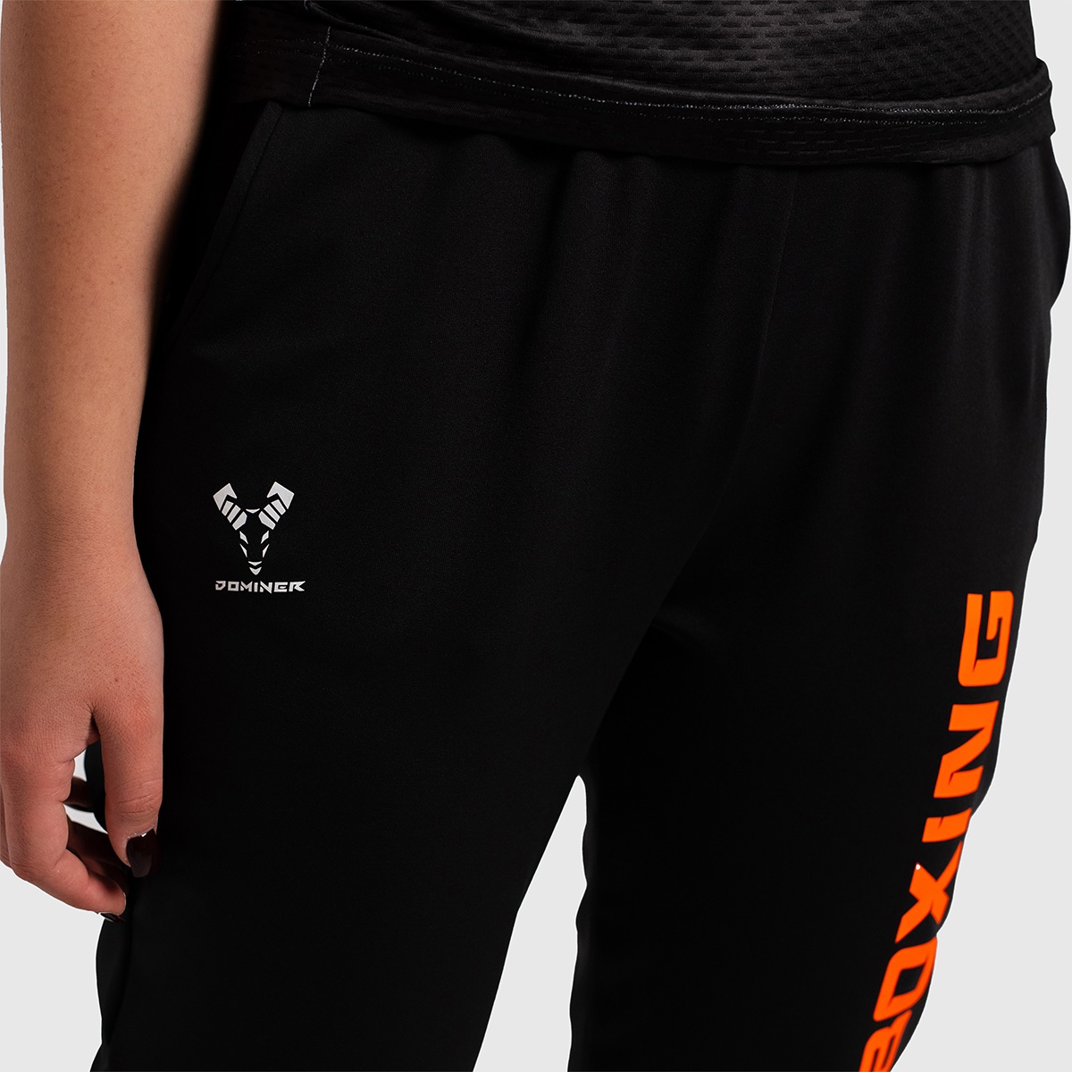 UNTAMED Iron Fist Joggers Woman BLACK ORANGE