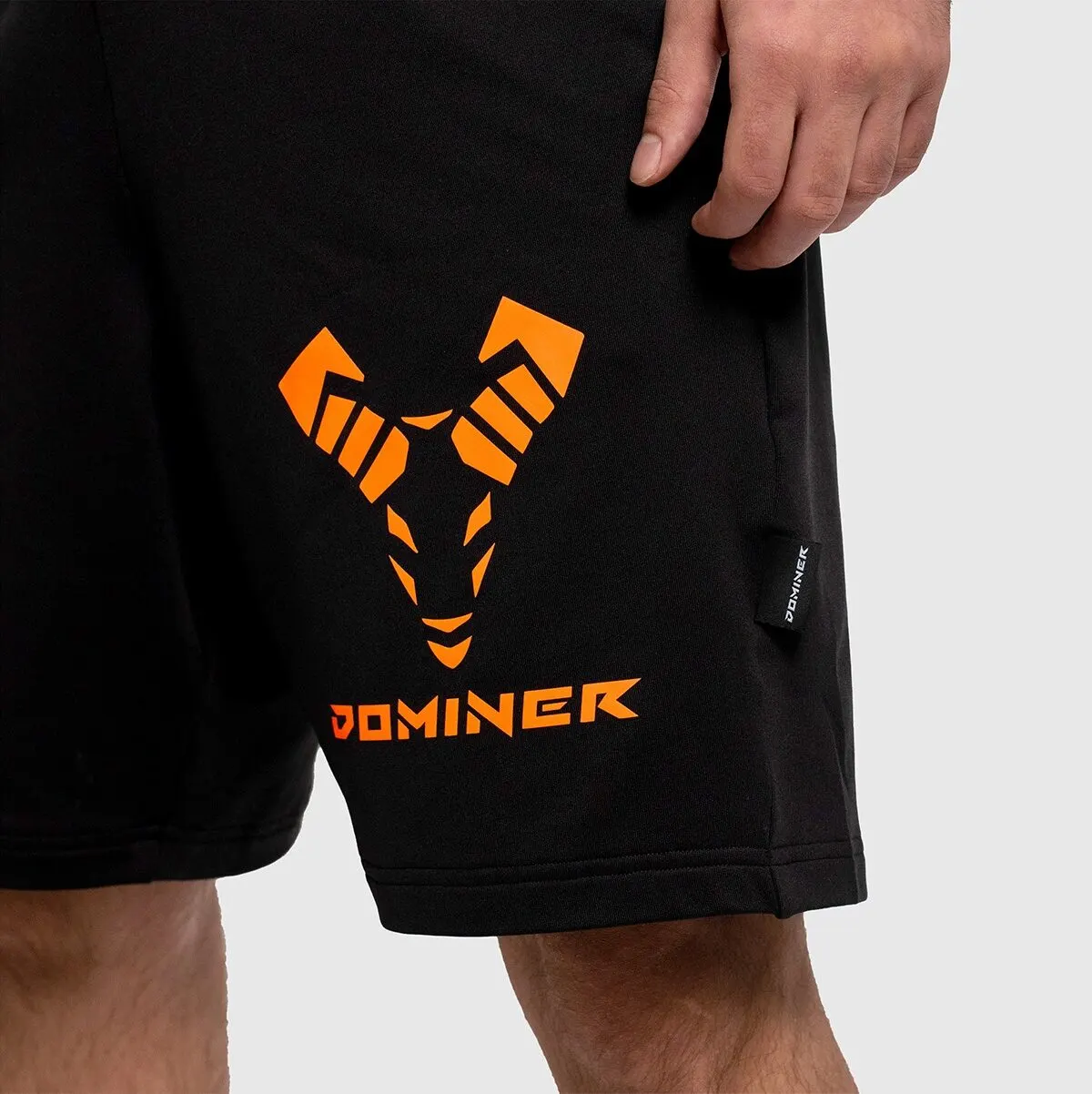 UNTAMED Iron Fist Shorts Man BLACK ORANGE